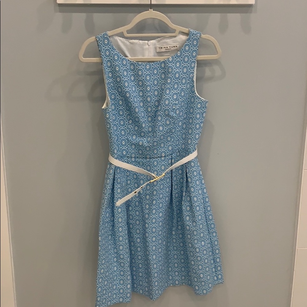Turquoise and white Trina Turk dress with pleats.
